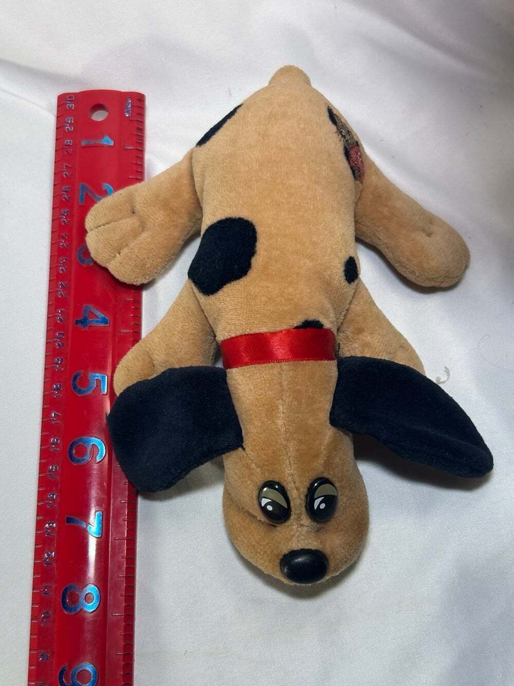 VTG Tonka Pound Puppy brown with black ears and red collar patch is worn